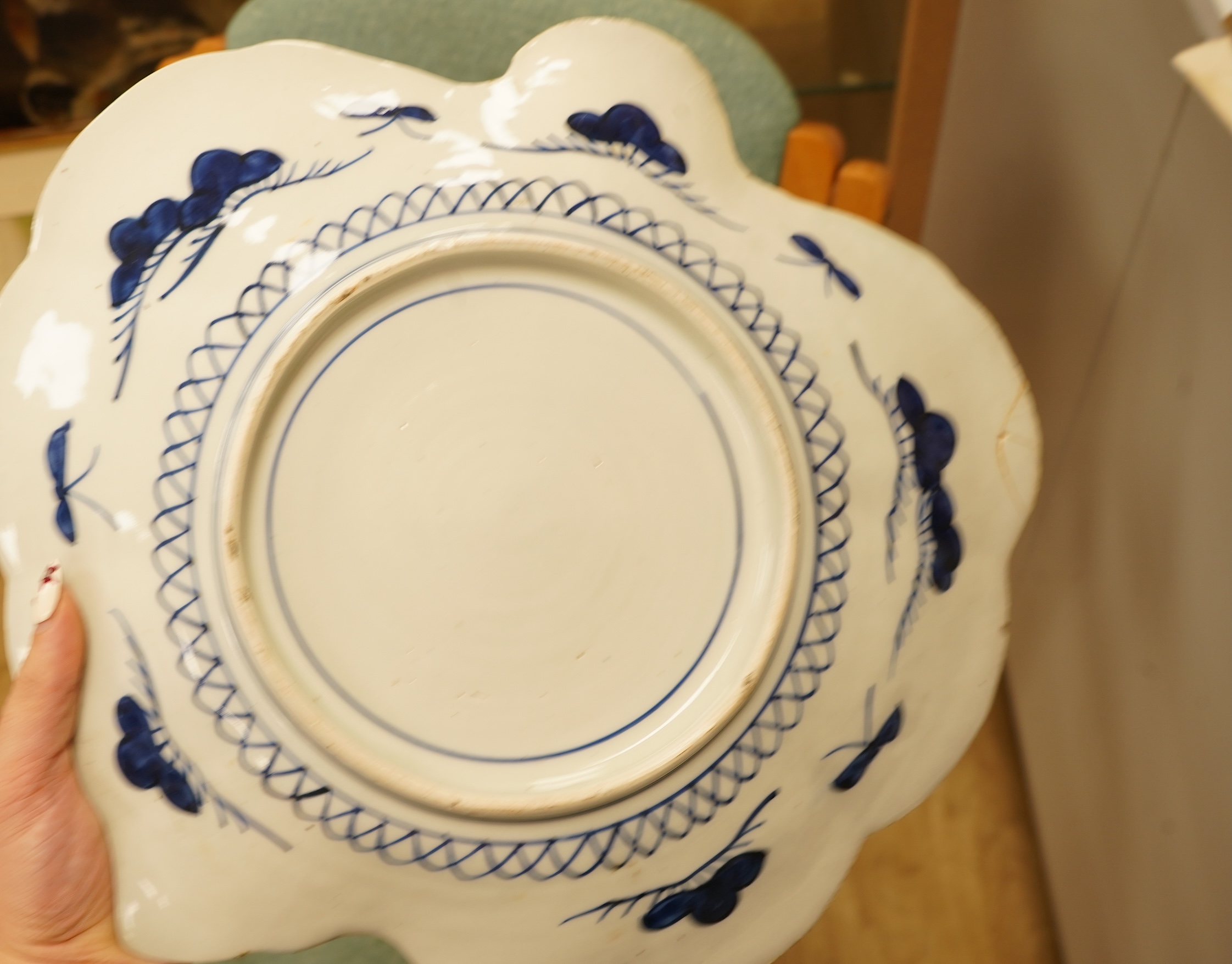 Two large Japanese Imari dishes, 19th century, to include one designed as an insect, largest 32cm wide